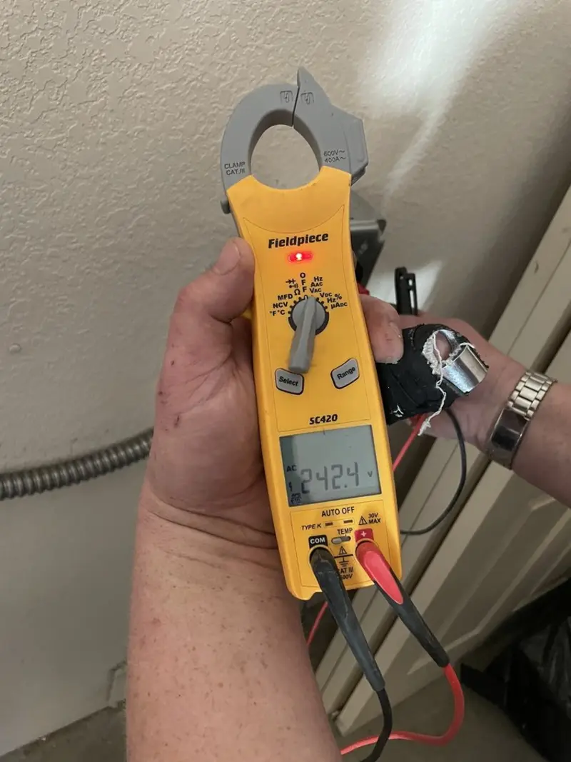 Voltage testing with clamp meter during Hot Tub / Pool Electrical Wiring in Bound Brook